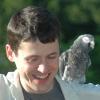 picture of Aaron with Elmer the parrot